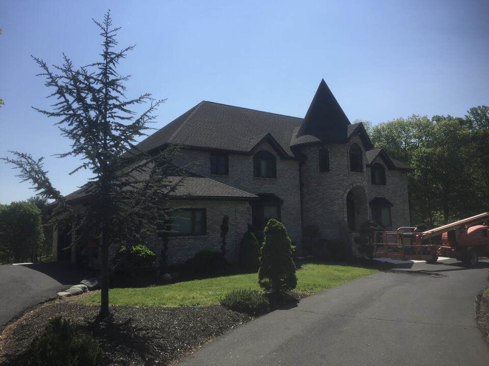 New roof on castle-style home